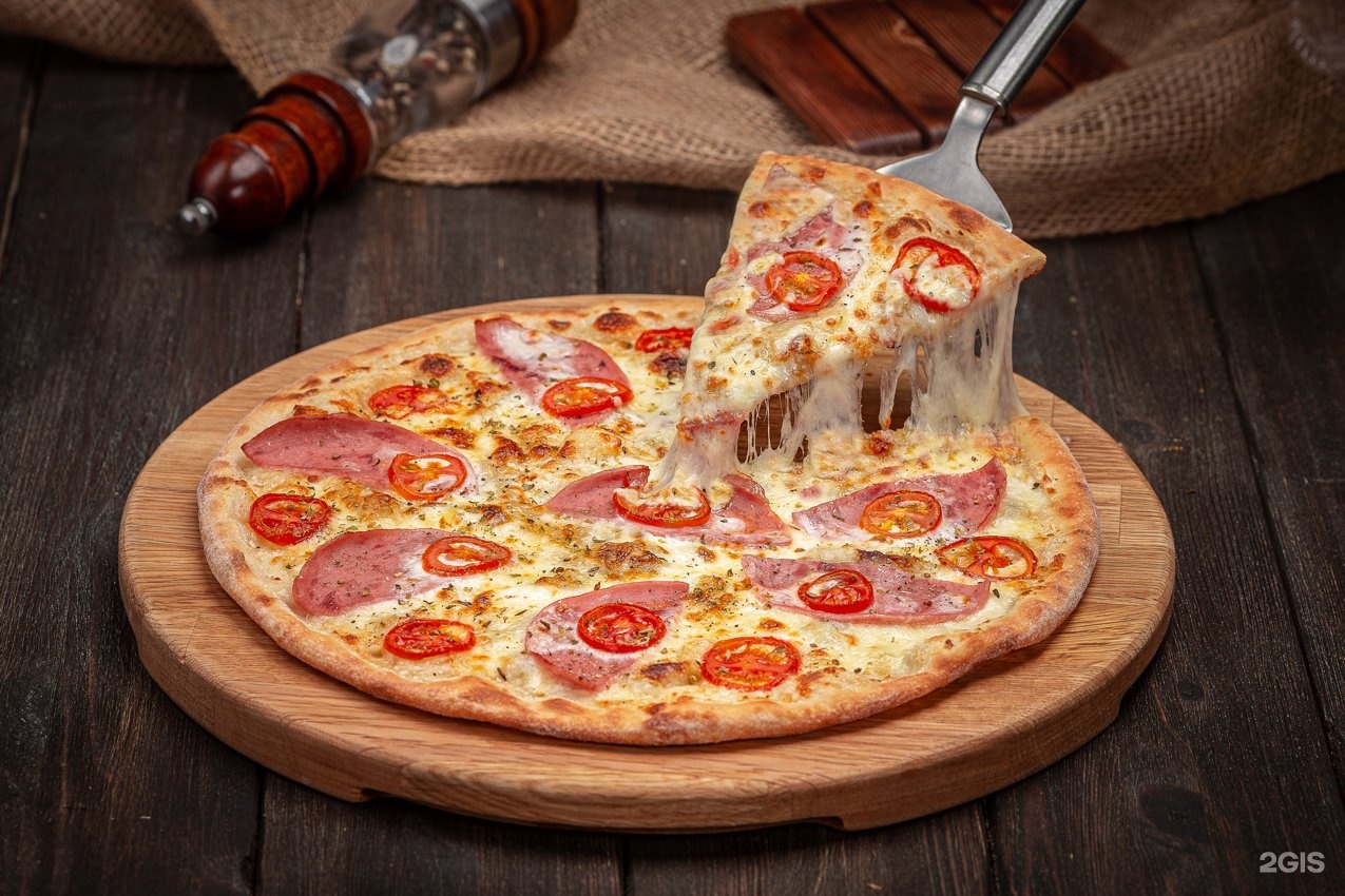 Тайгер пицца. Додо пицца ветчина и сыр. Пицца м Владивосток. Пицца м22 см. Колбаса для пиццы во Владивостоке.